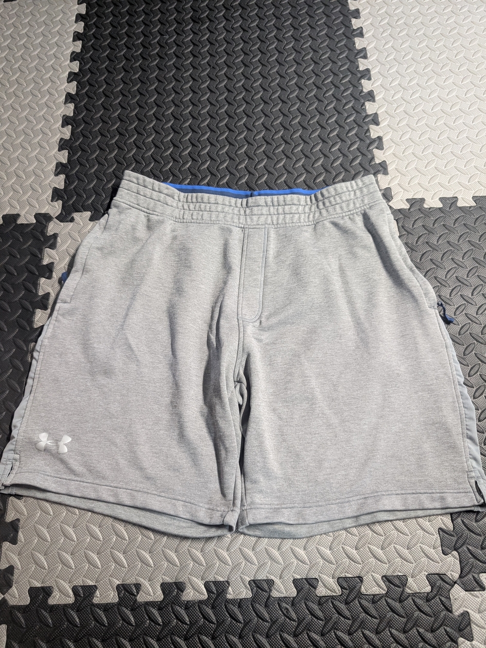 Under Armour Men's Light Gray Athletic Shorts with Blue Trim